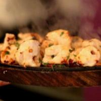 Murgh Malai Kebab · Tender boneless pieces of chicken marinated in creamy sauce, the cooked on skewers.