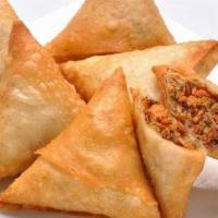 Chicken Samosa · Crisp fried turnover, filled with delicious, mildly spiced chicken.(3 pcs).