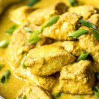 Chicken Korma · Chicken cooked in mild sauce with yogurt and freshly chopped green coriander.