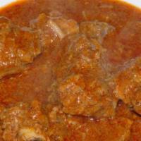 Lamb Vindaloo · Lamb and potatoes cooked in onion and tomato sauce.