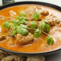 Lamb Curry · Lamb cooked with tomato, onion sauce and spices.