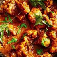 9-1-1 Chicken Curry (Very Spicy) · Chicken marinated with a mix of hot sauces and cooked in tomato onion sauce.