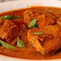 Fish Curry · Fish made in tangy and spices.