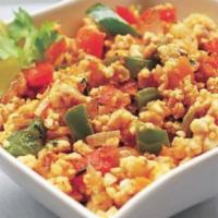 Egg Bhurji · Scrambled eggs gently cooked with tomatoes, onions and bell peppers with Indian spice.