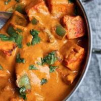 Paneer Tikka Masala · Fried paneer cubes cooked in tomato, onion sauce and spices.