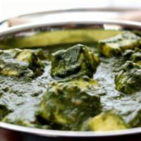 Saag Paneer · Finely cut garden-fresh spinach cooked with paneer and fresh herbs.