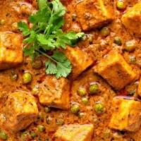 Mutter Paneer · Cottage cheese and green peas cooked with fresh onions and tomatoes.
