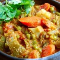 Mix Vegetable Curry · Mixed vegetables cooked in tomatoes, onions and spices.