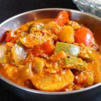 Vegetable Chetinadu · Curry prepared using vegetable, coconut and different spices.