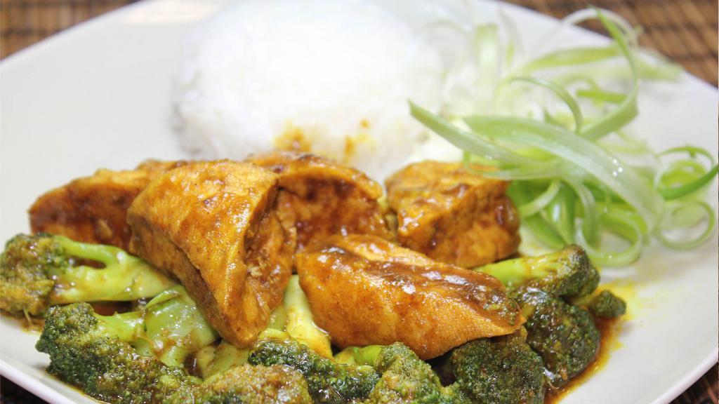 Curry Tofu With Broccoli · Curry seasoned dish.