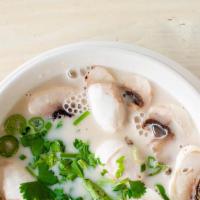 Coconut Soup · Tom Kha is one of the most famous Thai dishes serves with chicken or shrimp seasoned with le...