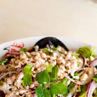 Larb Salad · Spicy. Ground chicken or ground pork seasoned with spicy lime sauce, mixed with ground roast...