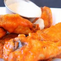 Chicken Wings · 8 bone in wings served Plain or tossed in BBQ, Buffalo or Big Kikis Habanero sauce.