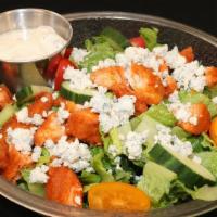 Buffalo Chicken Salad · Crispy Romaine Lettuce, Crispy Buffalo Chicken, Tomatoes, Cucumbers, Blue Cheese Crumbles an...