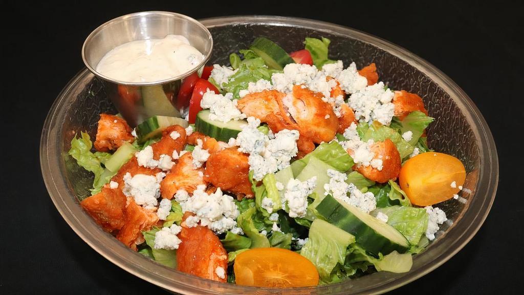 Buffalo Chicken Salad · Crispy Romaine Lettuce, Crispy Buffalo Chicken, Tomatoes, Cucumbers, Blue Cheese Crumbles and Blue Cheese Dressing