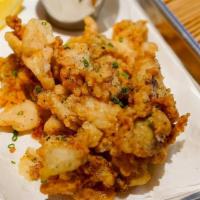 Crispy Calamari · Red onion, pickled chilis, scallion, chili-lime dipping sauce