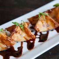 Lobster Rangoons · Local lobster, cream cheese, sliced scallions, sweet soy sauce.