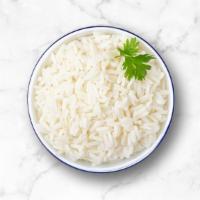 Steamed Rice · Long grain aromatic basmati rice, steamed to perfection