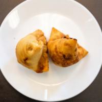 Vegetable Samosa · Top menu item. Cumin-flavored potatoes and peas filled in a baked pastry.