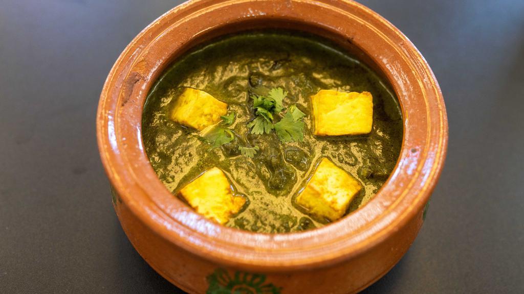 Palak Paneer · Top menu item. Fresh homemade cheese cubes served in freshly ground spinach. Served with rice.
