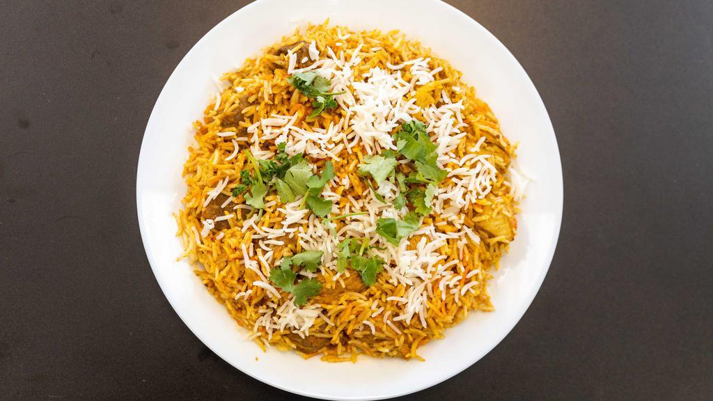 Special Lamb & Chicken Biryani · Long grain basmati rice cooked in a sealed pot with juicy pieces of lamb and pieces of chicken in a blend of exotic spices.