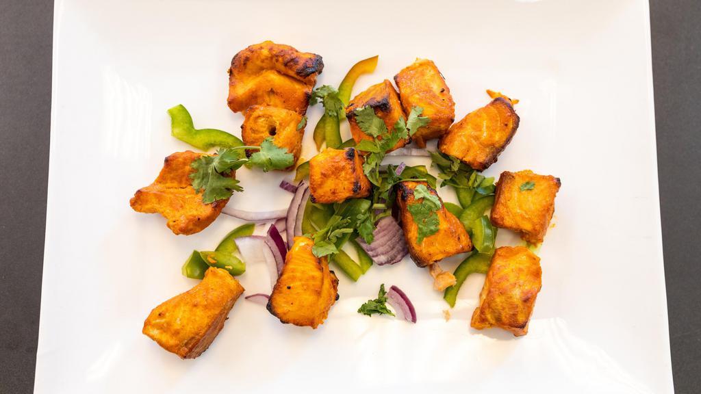 Salmon Tandoori · Salmon cutlet marinated in exotic spices and herbs barbecued in a clay oven.