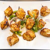 Garlic & Ginger Kebab · Succulent cubes of chicken, marinated in yogurt, garlic and ginger then roasted in clay oven.