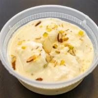 Rasmalai · Indian sweet made of cheese, milk and almonds.