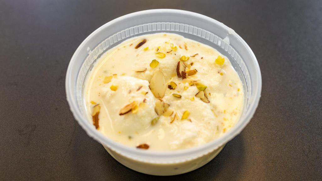 Rasmalai · Indian sweet made of cheese, milk and almonds.