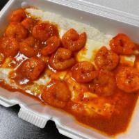 Shrimp And Grits · Sautéed shrimps (12) served with a side of grits (or your choice of side)
