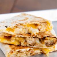 Kids Quesadilla · Protein & Cheese.
Sour Cream on the Side.