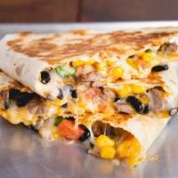 Quesadilla · Filled with cheddar and mozzarella, your choice of meat and toppings.