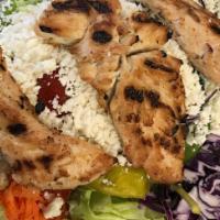 Grilled Chicken Caesar Salad · Add extra feta, dressing, or pita for an additional charge.