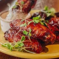 Chipotle Wings · crispy wings, savory chipotle. sauce, creamy blue cheese. dressing