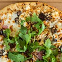 The Fig Pizza · Marasala wine reduction, sliced figs, crumbled goat cheese, prosciutto, and arugula. Eleven ...