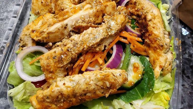 Chicken Salad · Our garden salad topped with our freshly homemade chicken salad.