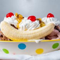 Banana Split (Hand Dipped) · Chocolate syrup, crushed pineapple, strawberry topping over three scoops of hand dipped ice ...