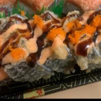Godzilla Roll (6) · Six pieces. Deep-fried. Spicy tuna and avocado. Topped with spicy mayo, eel sauce, masago