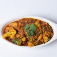 Mix Veg Masala · Carrot, potato, green peas and cauliflower cooked with onion, tomatoes and creamy sauce in a...