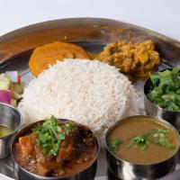 Bhanchha Set · A traditional way of serving rice, lentil, mustard green, choice of meat or veg, salad, and ...