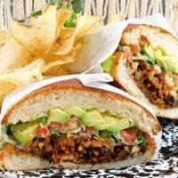 Vegan Torta · house pambazo sandwich filled w/pickled jalapeños, avocado, pico de gallo, black refried bea...