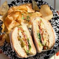 Ham & Cheese Torta · house sandwich filled w/pickled jalapeños, avocado, tomatoes, onions, lettuce, chipotle mayo...