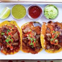 Carne Asada Taco Platter- Sf Style · 3 taco platter of heirloom tortillas topped w/melted cheese, grilled grass-fed thinly sliced...