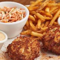 Jumbo Lump Crab Cakes · Sustainable, wild caught, two crab cakes with tarragon, Old Bay crispy fries, coleslaw, hous...