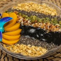 Charcoal Bowl · Blended banana, mango, peach, charcoal, and milk of your choice. Topped with granola, chia s...