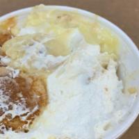 Caramel Banana Pudding · Homemade Vanilla Pudding, layered between fresh bananas, caramel sauce and Nilla wafers, top...