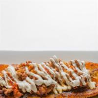 Platano Yuccateco · Sweet plantain stuffed with ground beef, topped with jalapeno cheese, and garnished with sou...