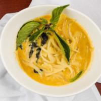 Yellow Curry  · Green and red pepper, tofu, bamboo shoot, Thai basil and onion.