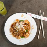 Pad Thai · Thin rice noodles, egg, peanuts, scallions, red bean curds, and bean sprouts stir-fried in a...