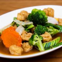 Veggie Delight · Assorted fresh vegetables sautéed in a light soy sauce with garlic.